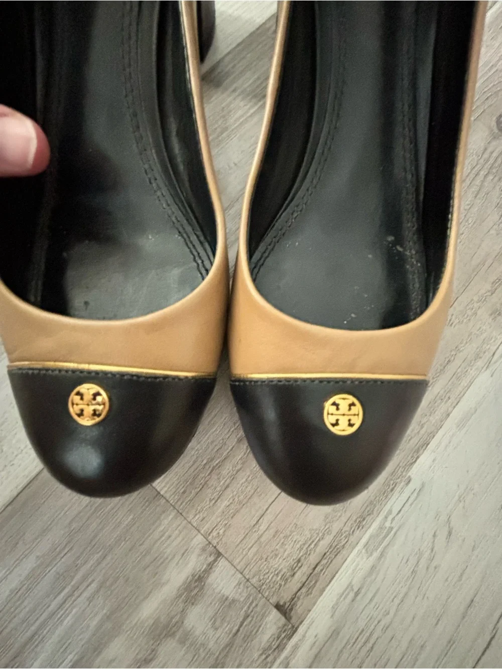 Tory Burch Two-Tone Tan and Black Cap-Toe Pumps with Gold Logo